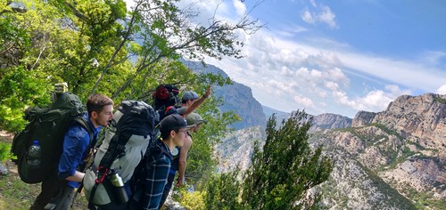 Spotting hikers on the other side of the canyon