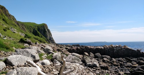 Walking on rocks with backpacks